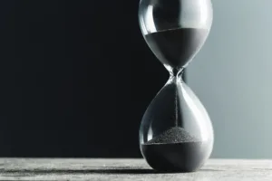 Hourglass on a stark background, symbolizing Four Months Left in the year plan.